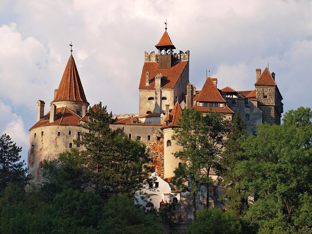 Bran Castle above the surrounding woodland